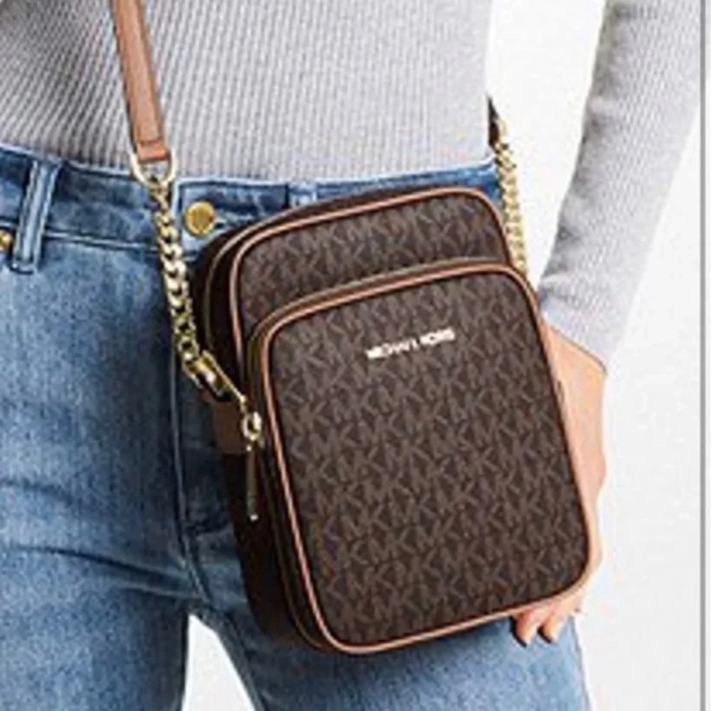 MICHAEL KORS 
Jet Set Travel Medium Logo Crossbody Flight Bag
# 35F1GTVC2B
Brown - Picture 9 of 16